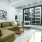 Spacious living room in The Draper apartments in Uptown 