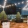 view of rooftop pool at apartments in Uptown Chicago at night