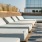 reclining pool chairs by rooftop pool at Uptown Chicago apartment building