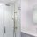 All white bathroom with gold accents