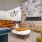 Common room with fireplace at apartment building in Uptown Chicago