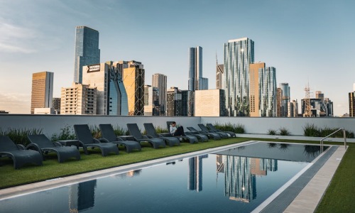 Chicago rooftop pool at sunset - apartments with resort amenities